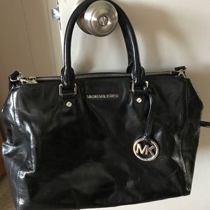 Michael Kors black satchel purse.